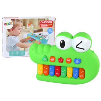 Oktatási zenei zongora krokodil formájú, zöld, hangokkal és fényekkel kép